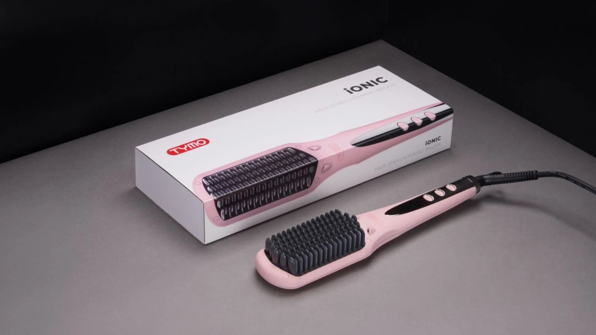 Beautiful packaging of TYMO iONIC PINK ceramic hair straightening brush complete set.
