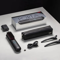 Complete packaging of TYMO PORTA cordless hair straightener with accessories including USB cable and travel pouch.