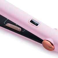 Compact TYMO SWAY portable hair iron in pastel pink with digital temp display