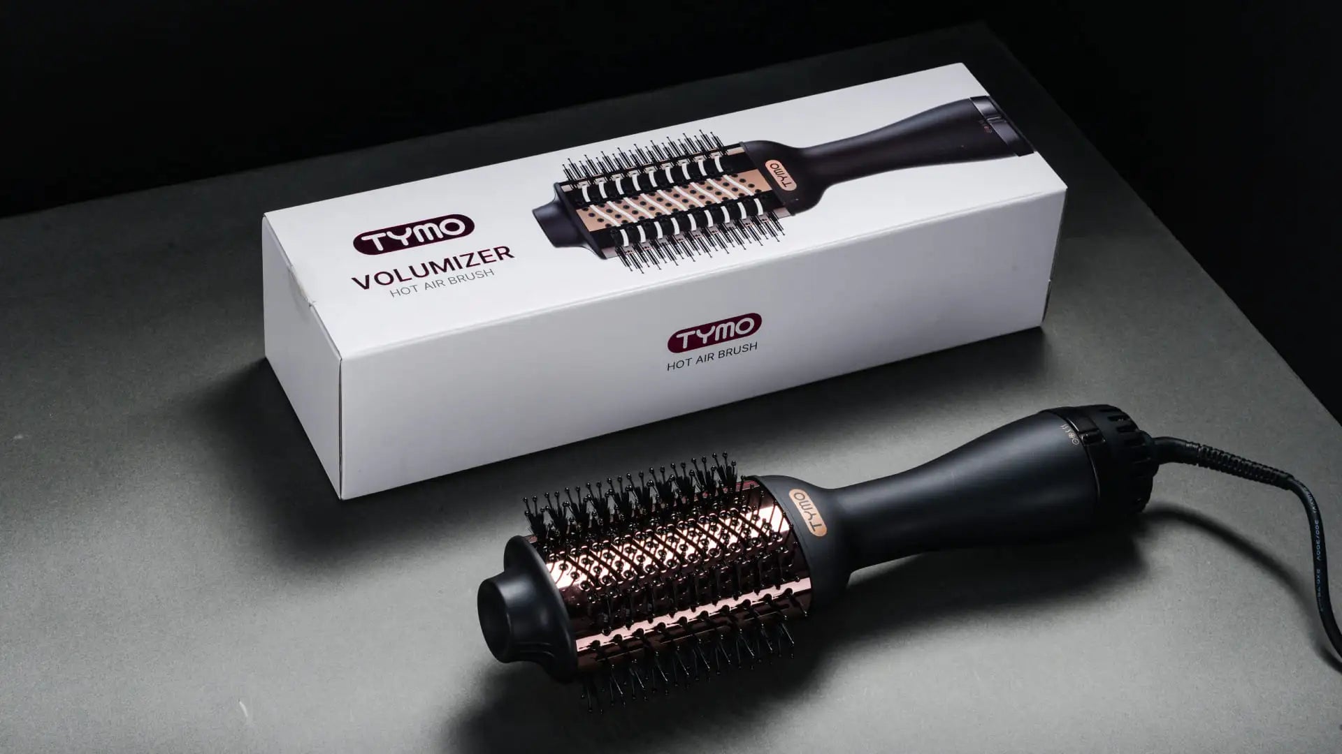 Complete set of TYMO VOLUMIZER negative ion blow dryer brush with accessories.