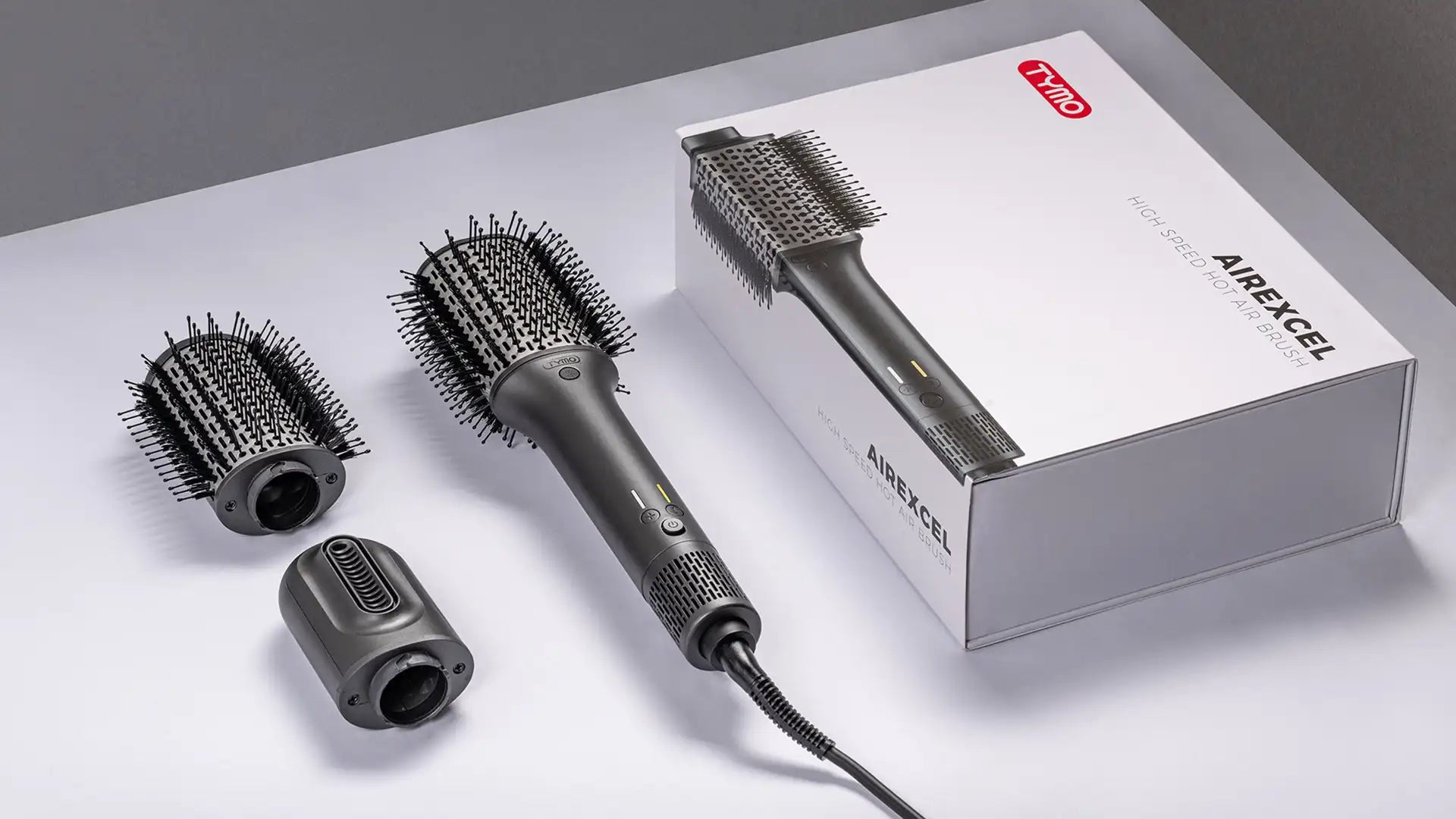 Complete set includes TYMO AIREXCEL paddle brush with 3 attachments.