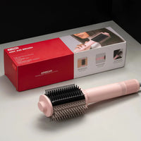 TYMO AIRBEAM hot air brush for quickly styling wet hair.