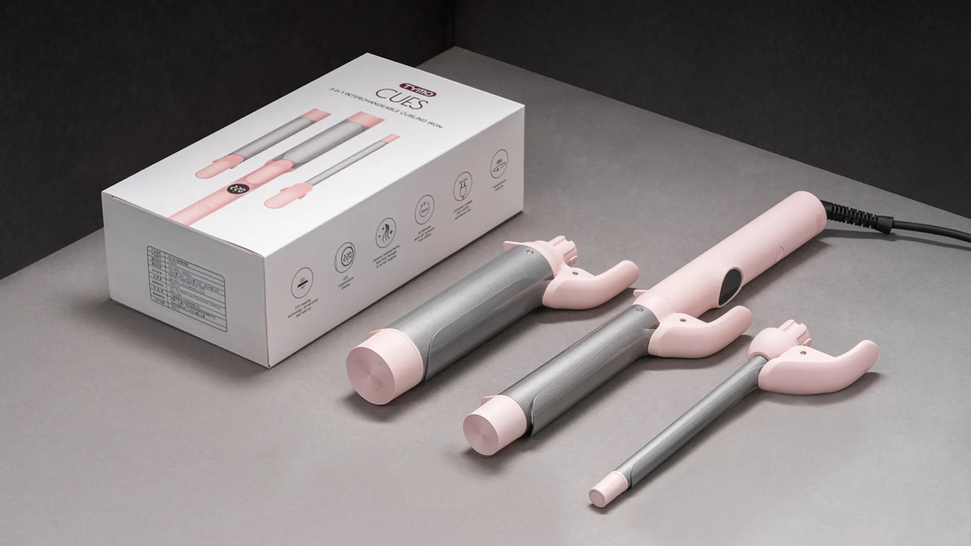 Complete TYMO CUES PINK set includes curling iron and 3 interchangeable barrels.