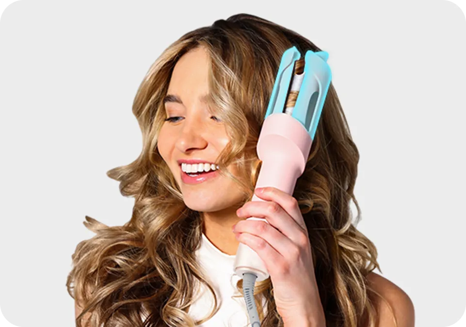 Model using TYMO CURLPRO auto curling iron for hair with protective shield.