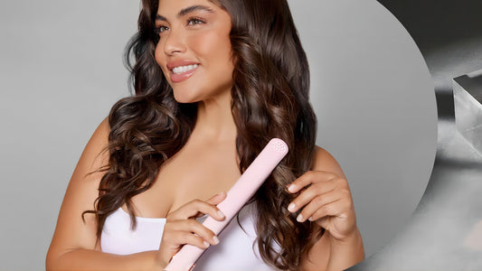 Woman creating curls with TYMO Sway flat iron, demonstrating versatile styling