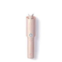 
                  
                    TYMO CURLGO hair curler in pink, a sleek and modern hair styling tool for perfect curls.
                  
                