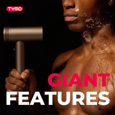 Person holding the dark grey TYMO AIRHYPE Hair Dryer against a dark background with bold "GIANT FEATURES" text and water splash details.