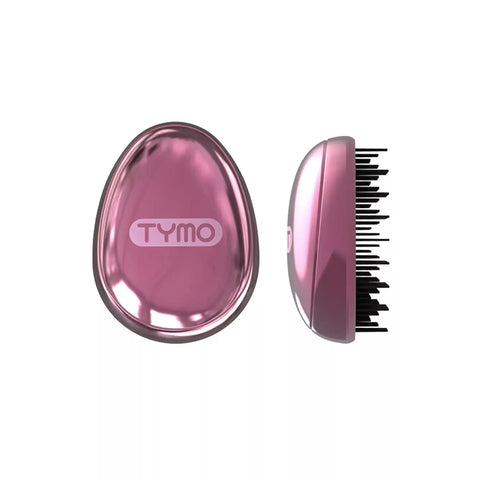 Front and side views of the metallic sakura pink TYMO Detangling Brush with black multi-length bristles on a clean white background.