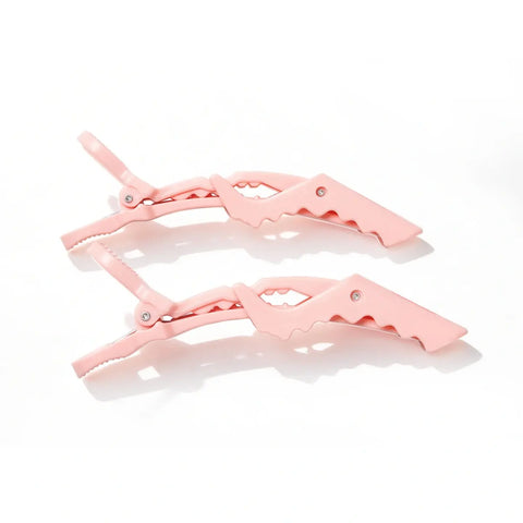 Pair of pink TYMO Alligator Sectioning Clips featuring flexible double-hinged joints and ergonomic anti-slip serrated teeth for secure grip