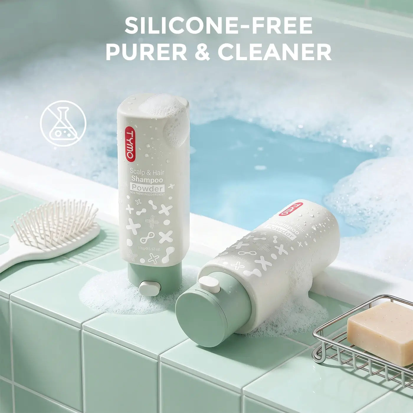 Two bottles of TYMO Purifying Shampoo Powder with rich foam on a mint green tiled bathtub edge alongside a hairbrush and soap bar.