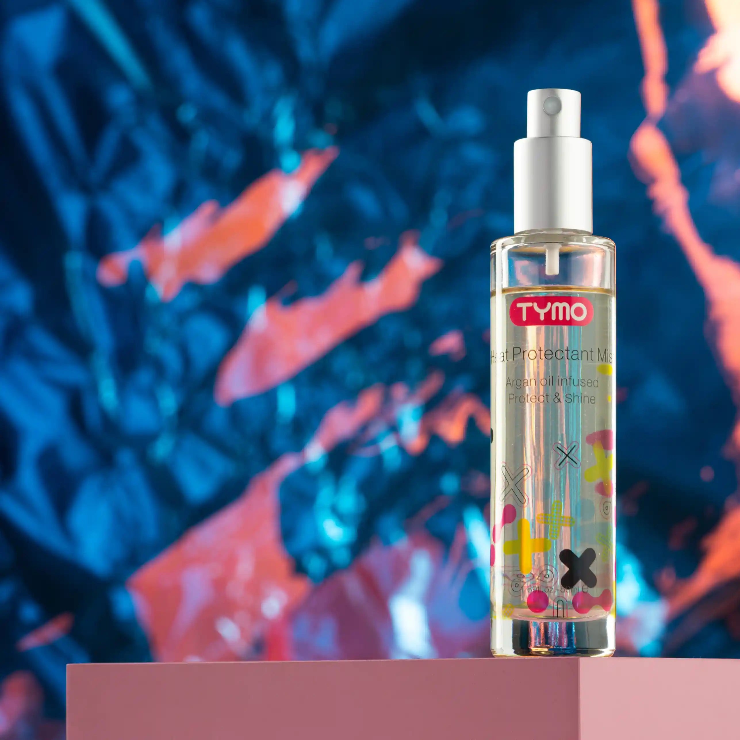 TYMO Heat Protectant Spray is displayed, highlighting the product's heat defense technology.