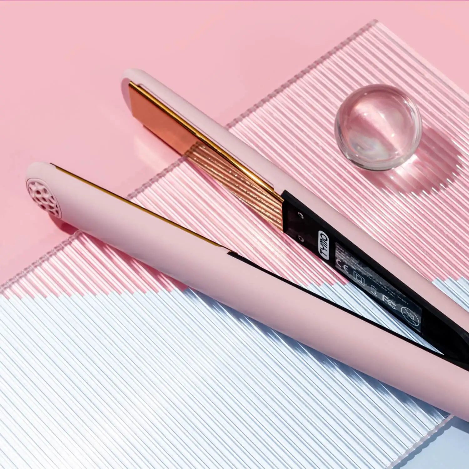 TYMO SWAY hair straightener flat iron featured on a stylish background, illustrating the modern design and compact structure for easy travel.