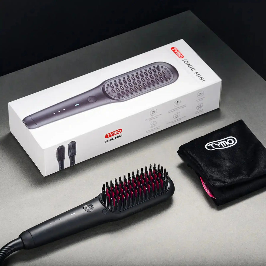 Complete packaging of TYMO iONIC MINI includes a hair straightening brush and a travel bag.