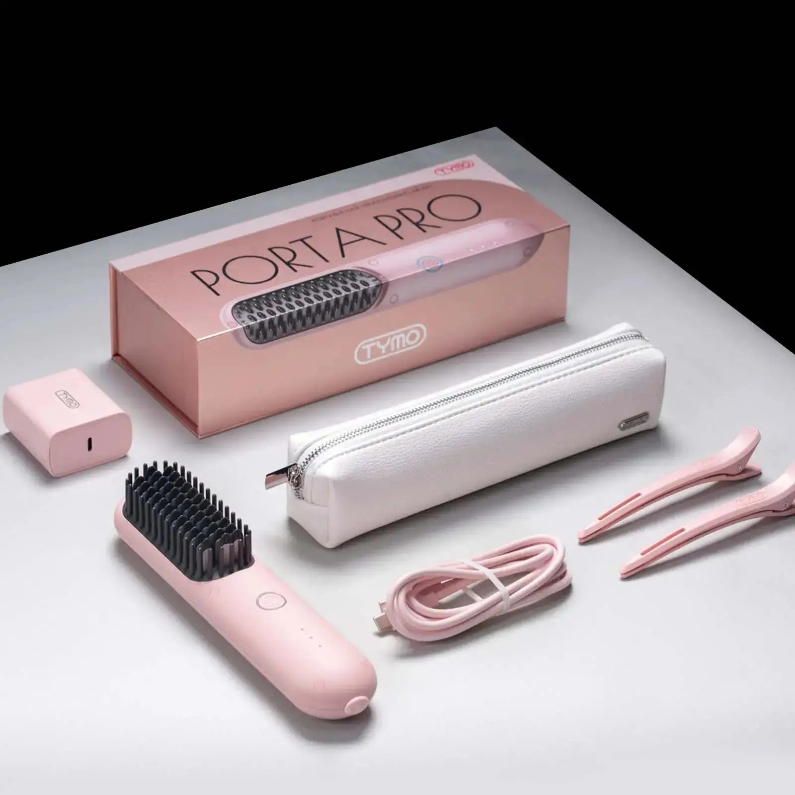 TYMO PORTA PRO PINK electric hair brush with an upgraded ionic system, effectively tames frizzy hair.
