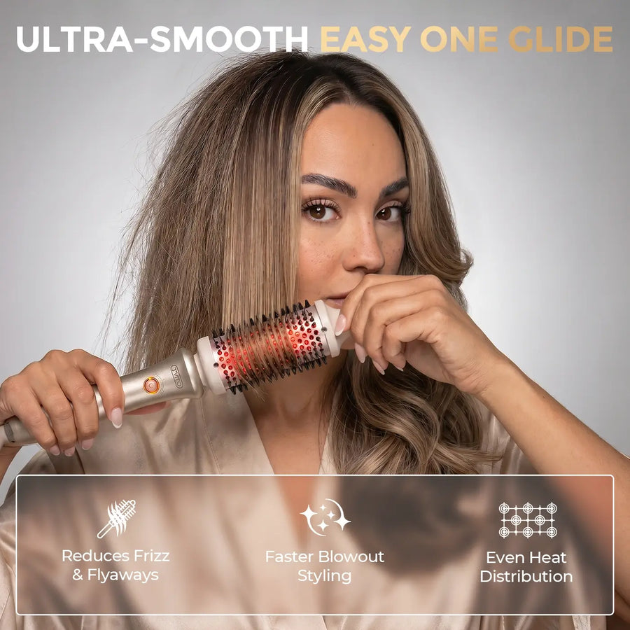 Female styling hair with TYMO infrared hot brush for smooth blowout