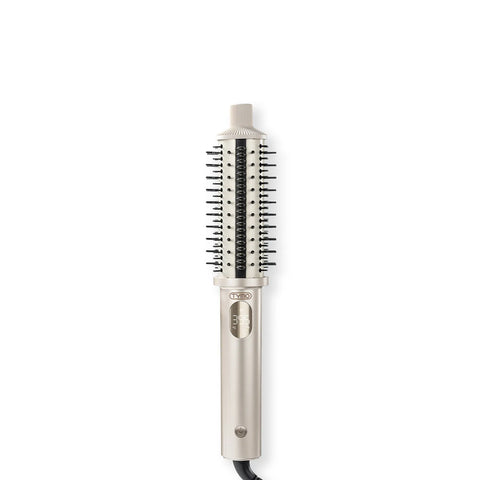Product pack shot of the TYMO STYLUX PRO featuring a champagne gold handle, digital temperature display, and a styling barrel.